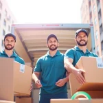 Cheap movers expertly loading boxes into a truck, showcasing efficiency and professionalism.
